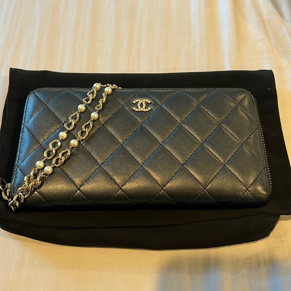 Chanel Black lambskin gusset wallet with pearl wrist chain
